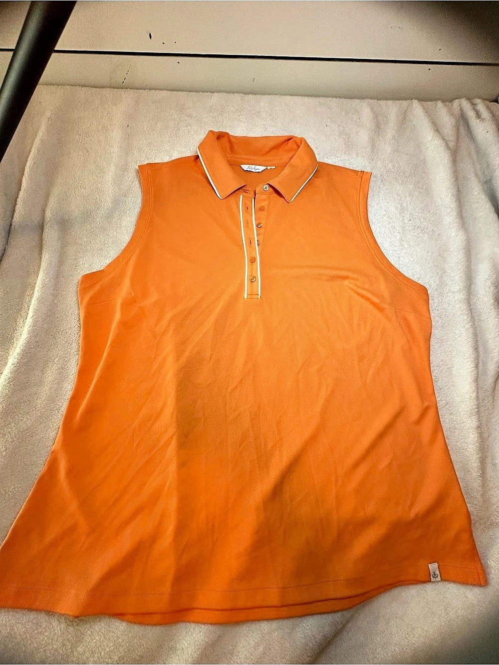 Lady Hagan Orange Sleeveless Polo